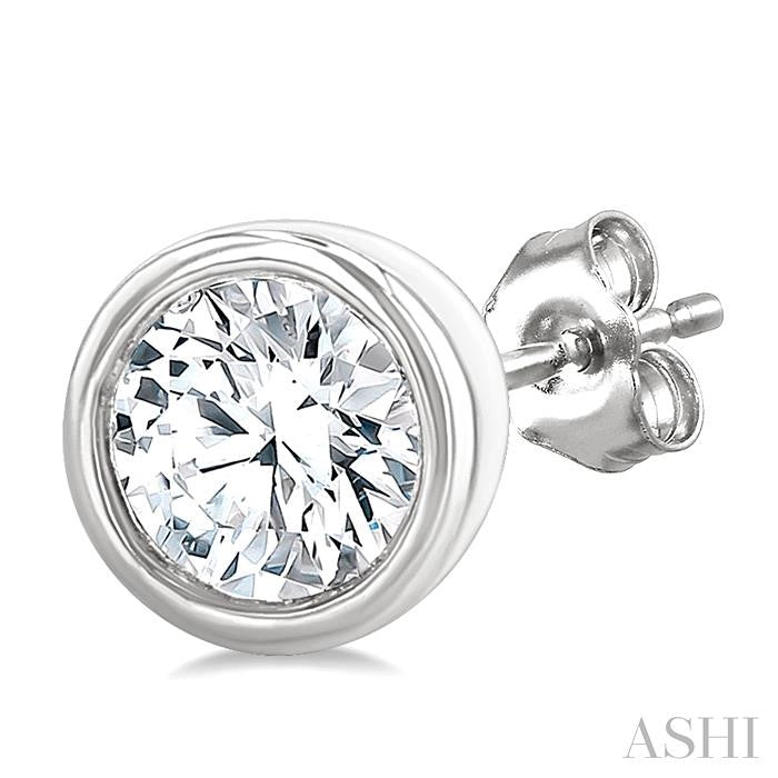 1/5 Ctw Petite Bezel Set Round Cut Diamond Fashion Stud Earrings in 10K White Gold