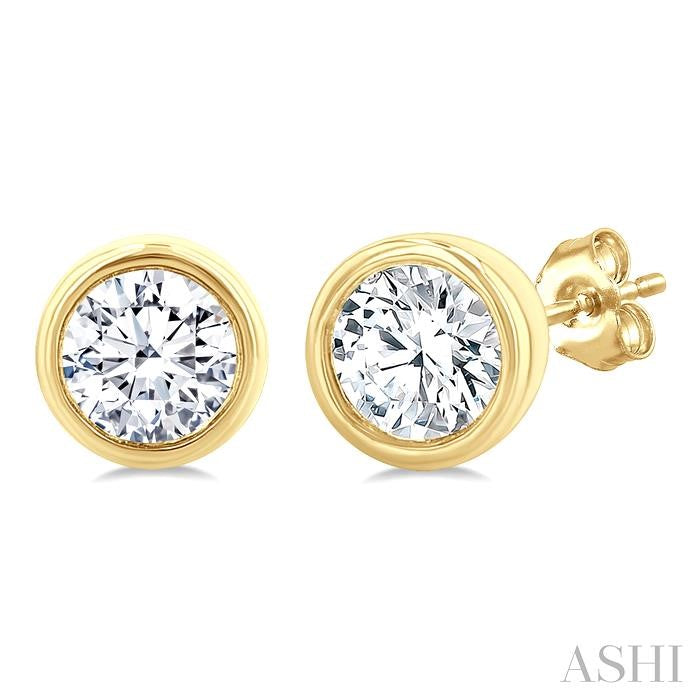 1/5 Ctw Petite Bezel Set Round Cut Diamond Fashion Stud Earrings in 10K Yellow Gold