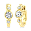 1/3 Ctw Bezel Set Round Cut Diamond Petite Huggie Earrings in 14K Yellow Gold