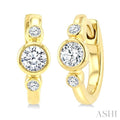1/3 Ctw Bezel Set Round Cut Diamond Petite Huggie Earrings in 14K Yellow Gold