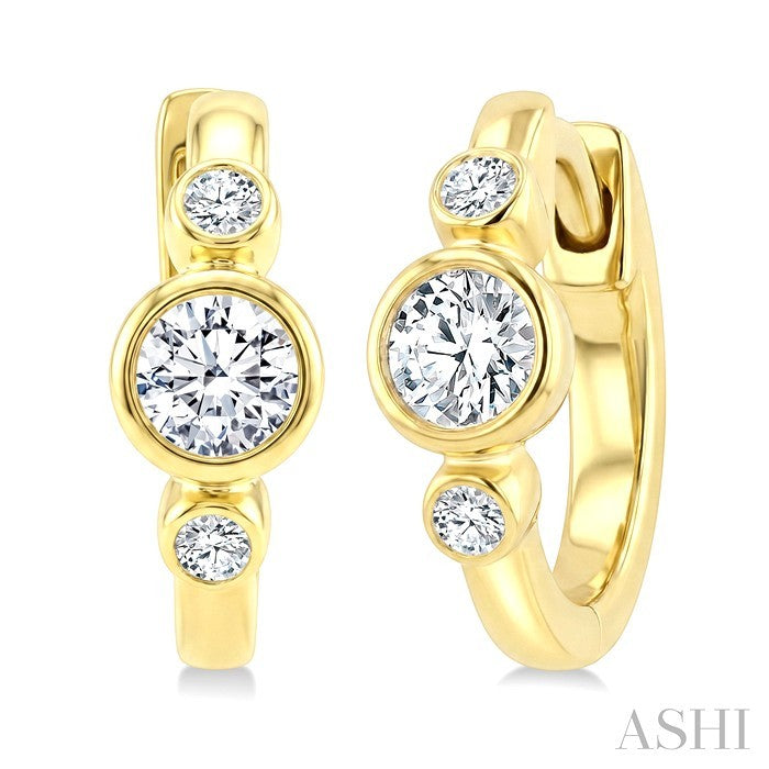 1/3 Ctw Bezel Set Round Cut Diamond Petite Huggie Earrings in 14K Yellow Gold
