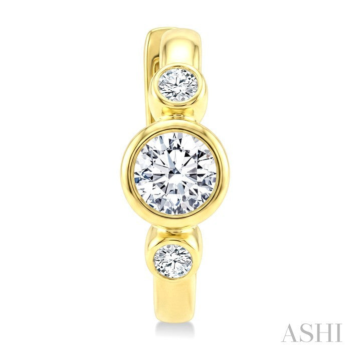 1/3 Ctw Bezel Set Round Cut Diamond Petite Huggie Earrings in 14K Yellow Gold