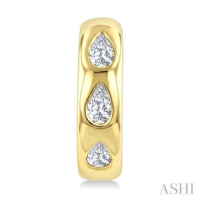 1/4 Ctw Bezel Set Pear Cut Diamond Petite Huggie Earrings in 14K Yellow Gold