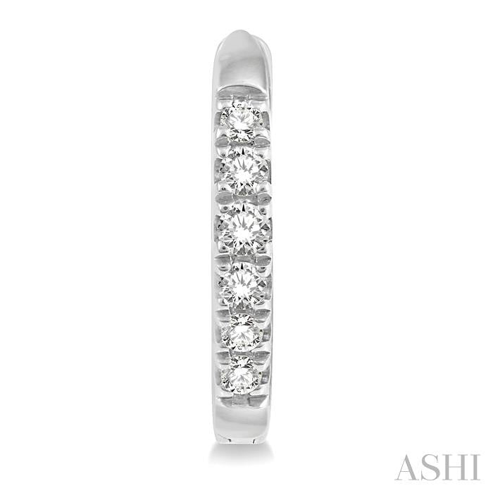 1/8 Ctw Round Cut Diamond Huggie Petite Earrings in 10K White Gold