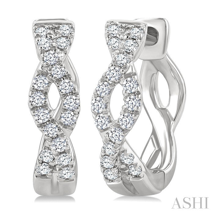 1/6 Ctw Entwined Round Cut Diamond Huggie Petite Earrings in 10K White Gold