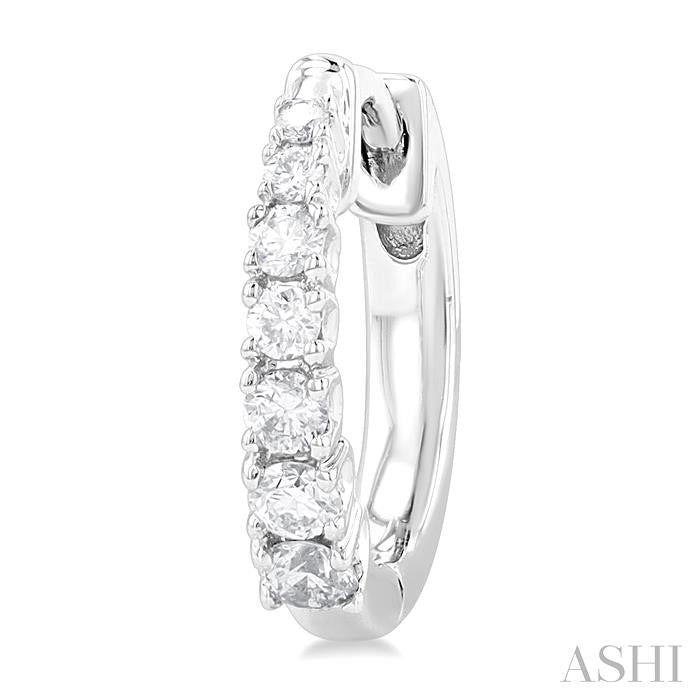 1/4 Ctw Graduated Round Cut Diamond Fashion Huggie Petites in 10K White Gold
