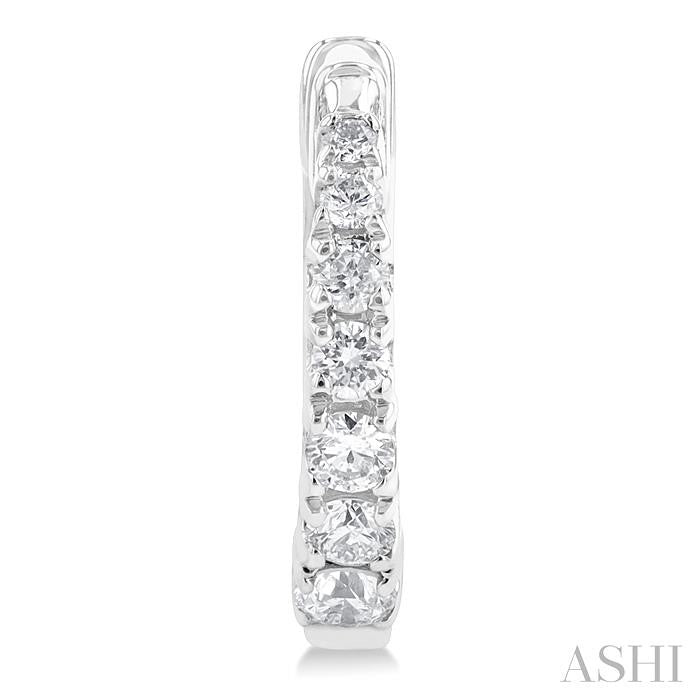 1/4 Ctw Graduated Round Cut Diamond Fashion Huggie Petites in 10K White Gold