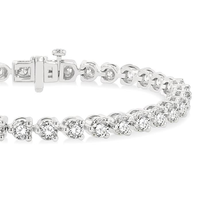 7 Ctw Tri-Prong Round Cut Diamond Tennis Bracelet in 14K White Gold