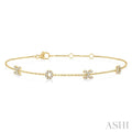 1/5 Ctw 'XO' Hugs and Kisses Round Cut Diamond Station Bracelet in 10K Yellow Gold