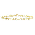 1/4 Ctw Leaf Accent Wavy Link Round Cut Diamond Fashion Bracelet in 10K Yellow Gold