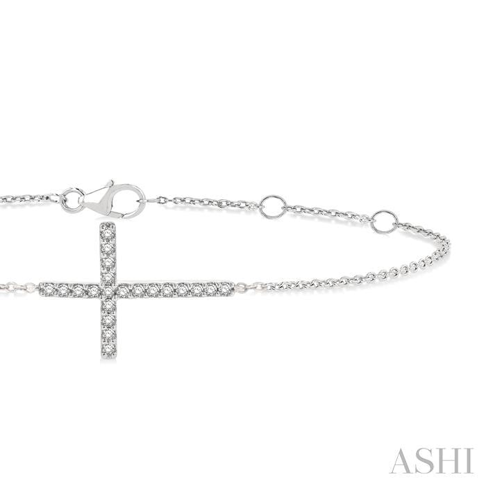 1/8 Ctw Petite Reclined Cross Round Cut Diamond Fashion Bracelet in 10K White Gold