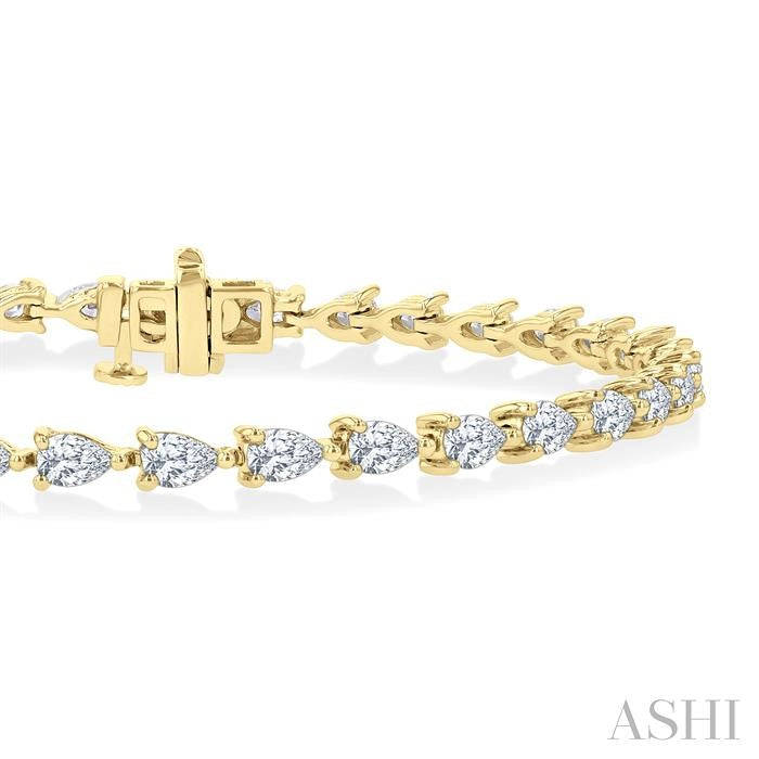 4 Ctw East West Pear Cut Diamond Fashion Tennis Bracelet in 14K Yellow Gold