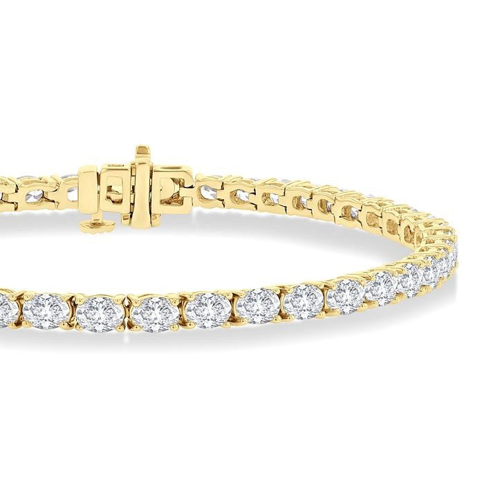 5 1/2 Ctw East West Oval Cut Diamond Fashion Tennis bracelet in 14K Yellow Gold