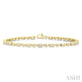 3/4 Ctw Bezel Set Baguette and Round Cut Diamond Fashion Bracelet in 14K Yellow Gold