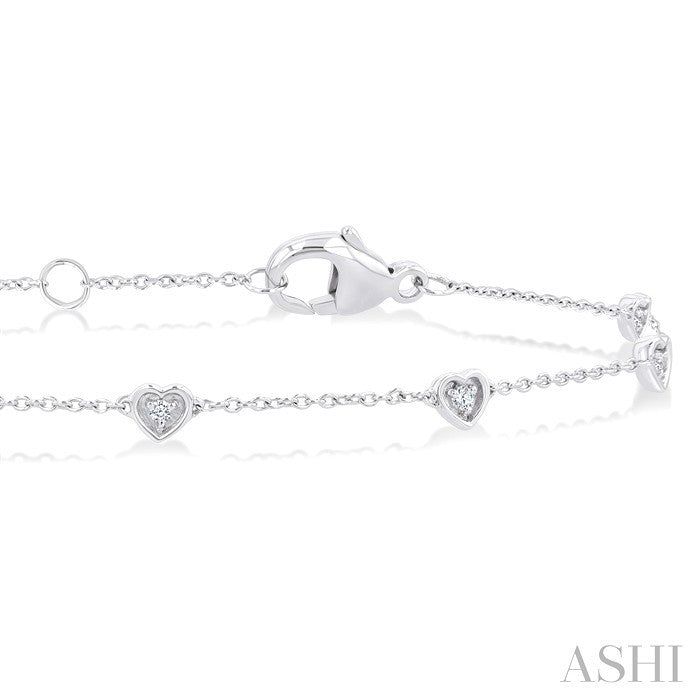 1/10 Ctw Petite Heart Round Cut Diamond Station Bracelet in 10K White Gold