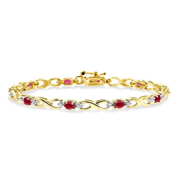 4x3 MM Oval Cut Ruby and 1/10 Ctw Round Cut Diamond Bracelet in 14K Yellow Gold