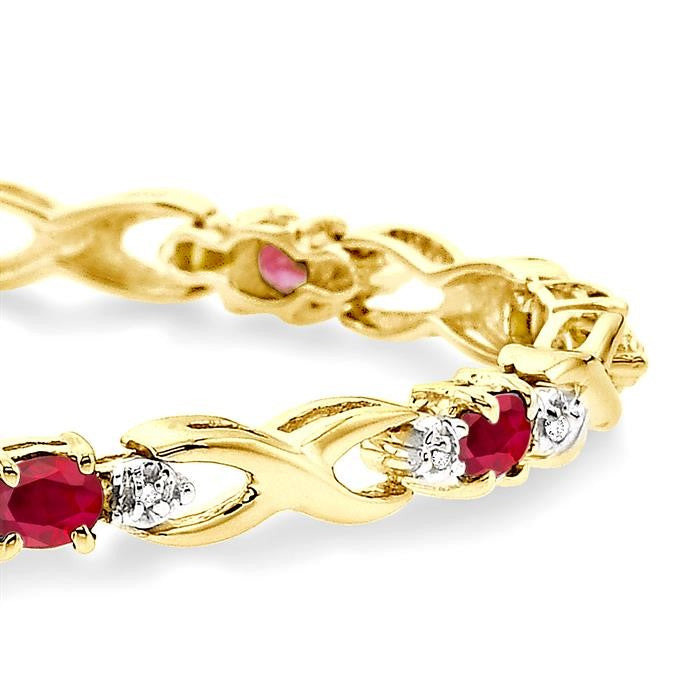 4x3 MM Oval Cut Ruby and 1/10 Ctw Round Cut Diamond Bracelet in 14K Yellow Gold