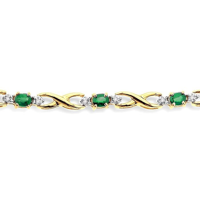 4x3 MM Oval Cut Emerald and 1/10 Ctw Round Cut Diamond Bracelet in 10K Yellow Gold