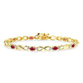 4x3 MM Oval Cut Ruby and 1/10 Ctw Round Cut Diamond Bracelet in 10K Yellow Gold