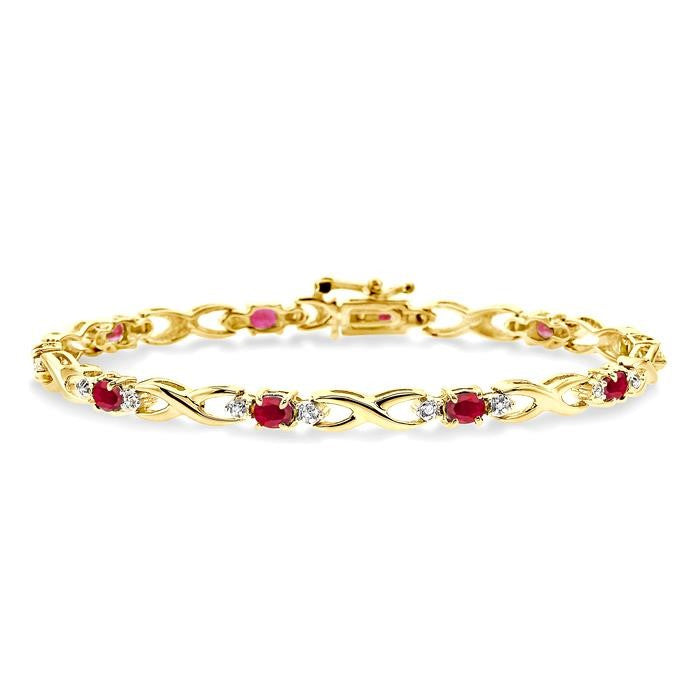 4x3 MM Oval Cut Ruby and 1/10 Ctw Round Cut Diamond Bracelet in 10K Yellow Gold