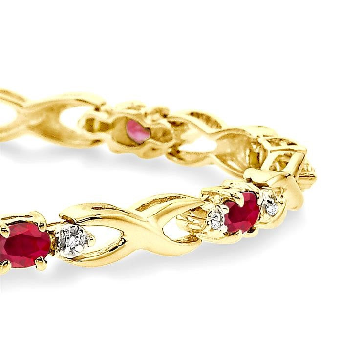 4x3 MM Oval Cut Ruby and 1/10 Ctw Round Cut Diamond Bracelet in 10K Yellow Gold