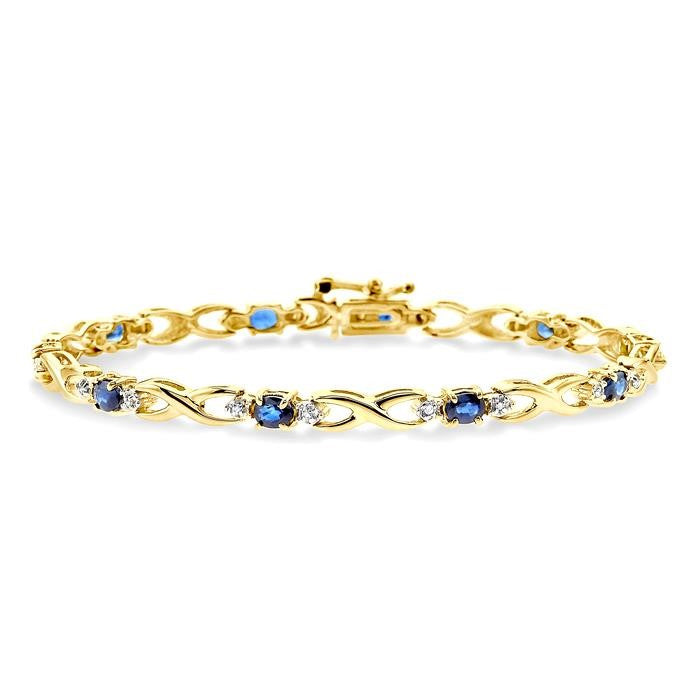 4x3 MM Oval Cut Sapphire and 1/10 Ctw Round Cut Diamond Bracelet in 10K Yellow Gold
