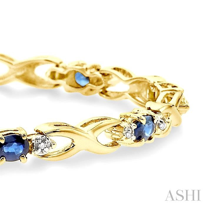 4x3 MM Oval Cut Sapphire and 1/10 Ctw Round Cut Diamond Bracelet in 10K Yellow Gold