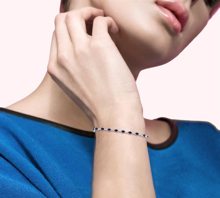4x3 MM Oval Cut Sapphire and 1/3 Ctw Round Cut Diamond Precious Bracelet in 10K White Gold