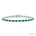 4X3 MM Oval Cut Emerald and 1/3 Ctw Round Cut Diamond Precious Bracelet in 14K White Gold