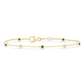 1.8 MM Emerald and 1/10 Ctw Bezel Set Round Cut Diamond Precious Gemstone Station Bracelet in 14K Yellow Gold