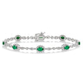 5x3 MM Oval Cut Emerald and 1/20 Ctw Round Cut Diamond Bracelet in 14K White Gold