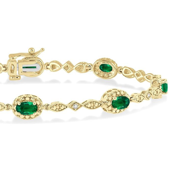 5x3 MM Oval Cut Emerald and 1/20 Ctw Round Cut Diamond Bracelet in 10K Yellow Gold