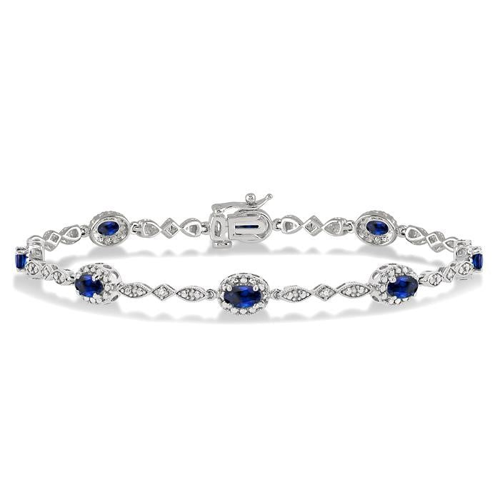 5x3 MM Oval Cut Sapphire and 1/20 Ctw Round Cut Diamond Bracelet in 10K White Gold