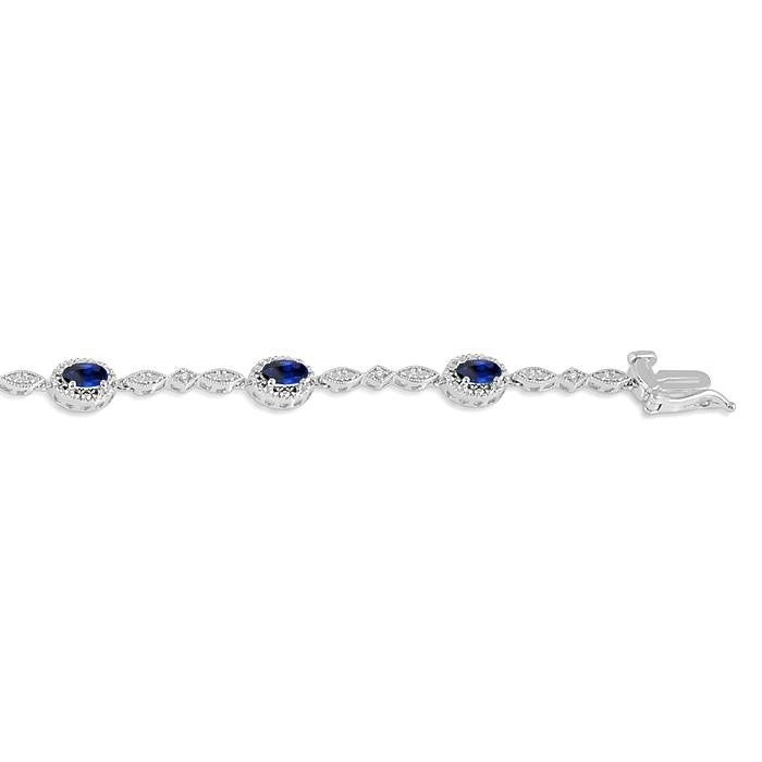 5x3 MM Oval Cut Sapphire and 1/20 Ctw Round Cut Diamond Bracelet in 10K White Gold