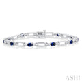 4X3 MM Oval Cut Sapphire and 1/10 Ctw Round Cut Diamond Paperclip Bracelet in 14K White Gold