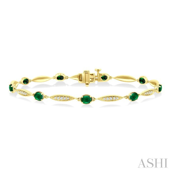 4X3 MM Oval Cut Emerald and 1/4 Ctw Round Cut Diamond Precious Bracelet in 10K Yellow Gold