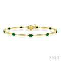 4X3 MM Oval Cut Emerald and 1/4 Ctw Round Cut Diamond Precious Bracelet in 10K Yellow Gold