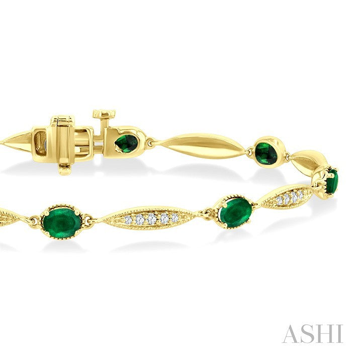 4X3 MM Oval Cut Emerald and 1/4 Ctw Round Cut Diamond Precious Bracelet in 10K Yellow Gold
