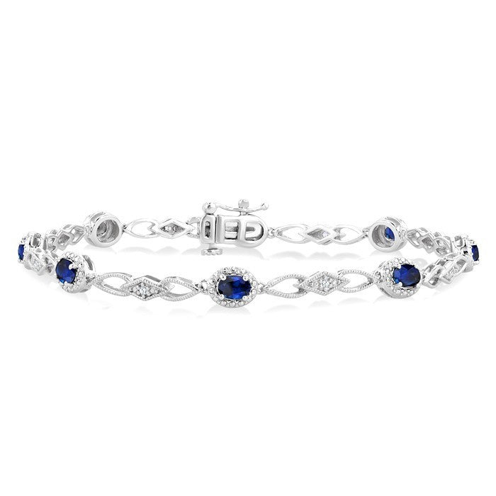 1/20 Ctw Oval Cut 4X3MM Sapphire and Round Cut Diamond Precious Fashion Bracelet in 10K White Gold
