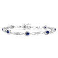 1/20 Ctw Oval Cut 4X3MM Sapphire and Round Cut Diamond Precious Fashion Bracelet in 10K White Gold