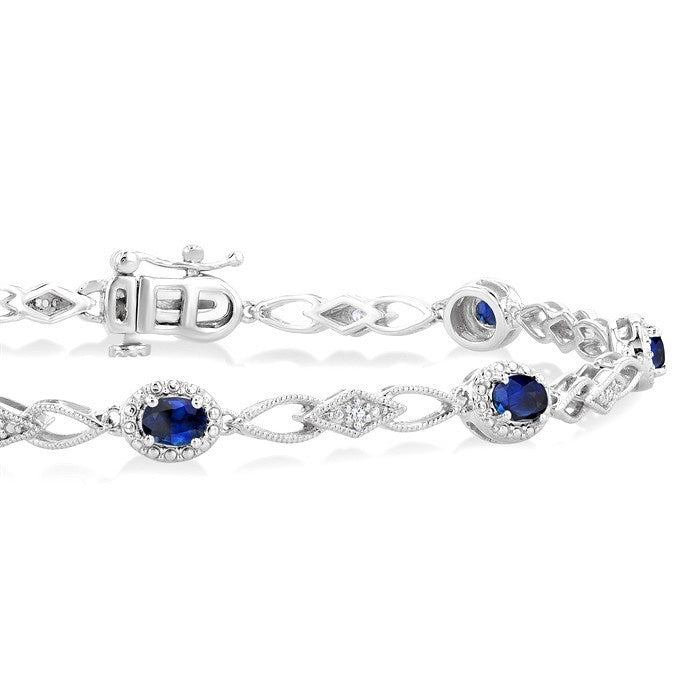 1/20 Ctw Oval Cut 4X3MM Sapphire and Round Cut Diamond Precious Fashion Bracelet in 10K White Gold