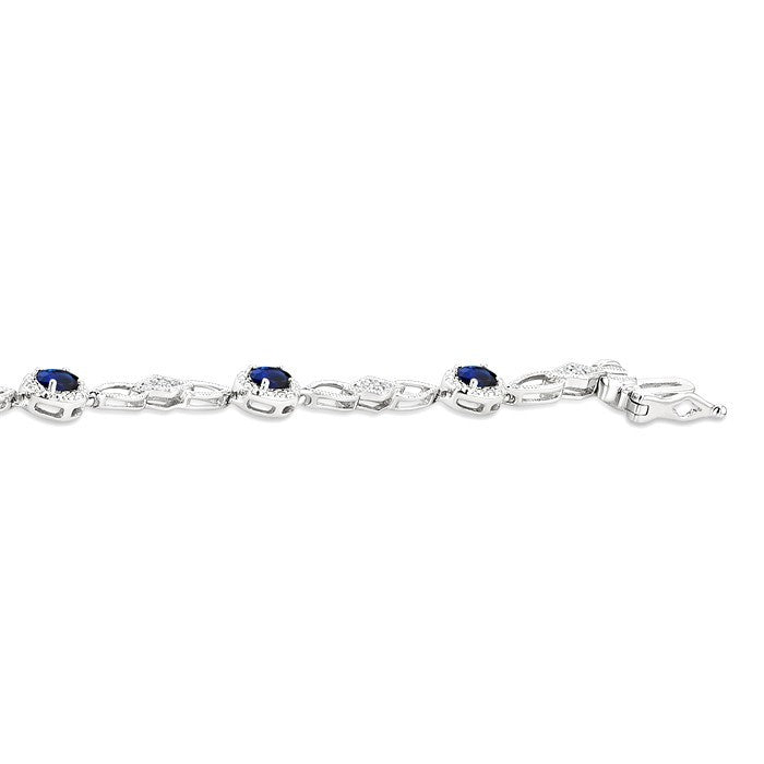 1/20 Ctw Oval Cut 4X3MM Sapphire and Round Cut Diamond Precious Fashion Bracelet in 10K White Gold