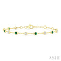 2.40 MM Round Shape Emerald and 1/3 Ctw Bezel Set Round Cut Diamond Precious Station Bracelet in 14K Yellow Gold