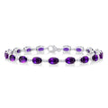 6X4 MM Oval Cut Amethyst and 1/6 Ctw Round Cut Diamond Semi-Precious Tennis Bracelet in 10K White Gold