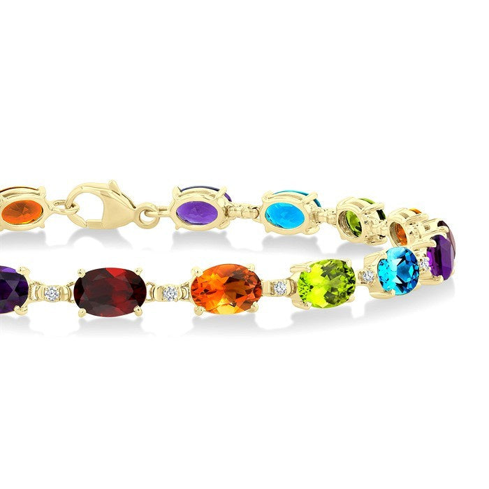 6X4 MM Oval Cut Multiple Gemstone and 1/6 Ctw Round Cut Diamond Semi-Precious Tennis Bracelet in 10K Yellow Gold