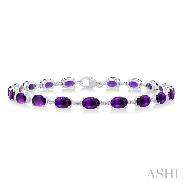 6X4 MM Oval Cut Amethyst and 1/6 Ctw Round Cut Diamond Semi-Precious Tennis Bracelet in 10K White Gold