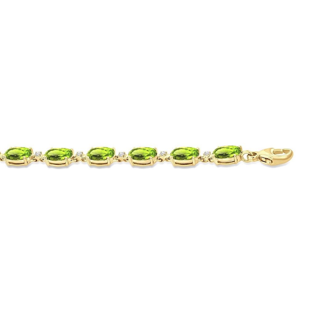6X4 MM Oval Cut Peridot and 1/6 Ctw Round Cut Diamond Semi-Precious Tennis Bracelet in 10K Yellow Gold