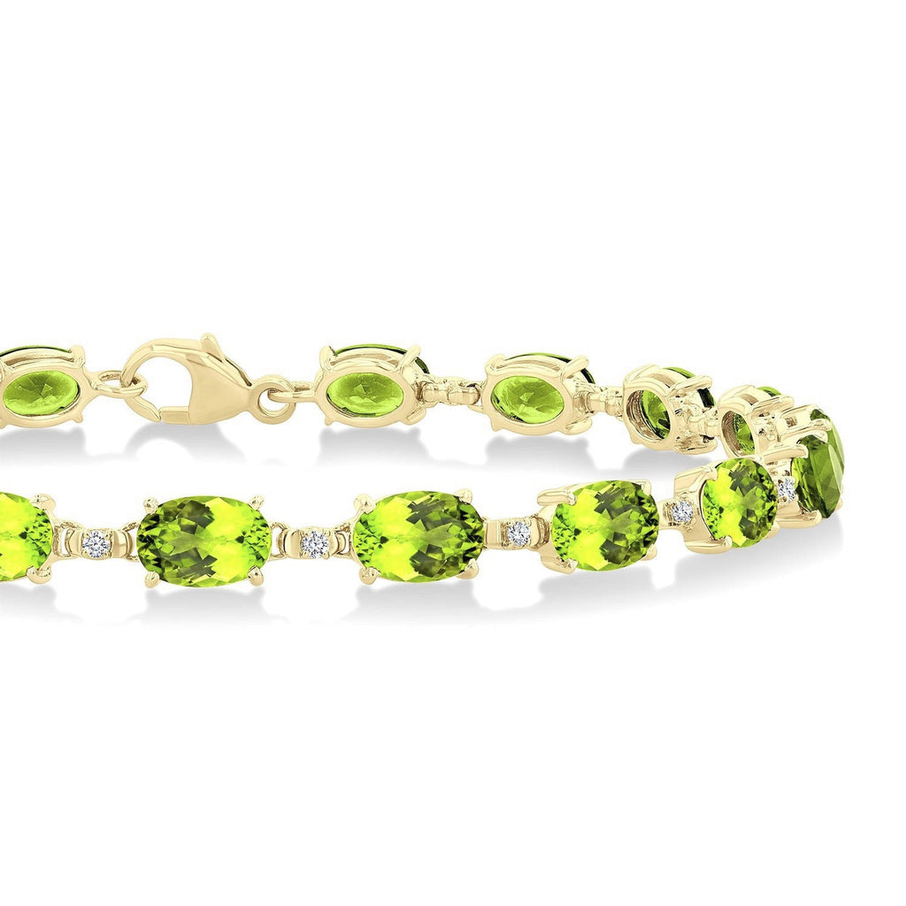 6X4 MM Oval Cut Peridot and 1/6 Ctw Round Cut Diamond Semi-Precious Tennis Bracelet in 10K Yellow Gold