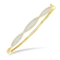 1 Ctw Elongated Twist Pattern Baguette and Round Cut Diamond Fashion Bangle in 14K Yellow Gold