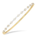 1 1/4 Ctw Baguette and Round Cut Diamond Fashion Bangle in 14K Yellow Gold